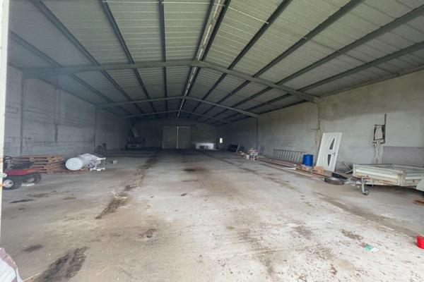 Ensemble Immobilier composé d'une maison et d'un hangar