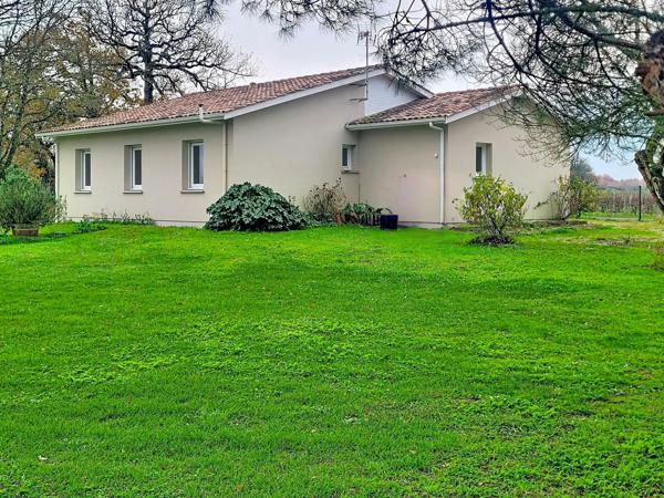 Ensemble Immobilier composé d'une maison et d'un hangar