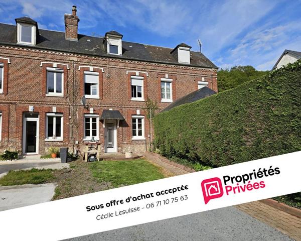 Maison 4 pièces avec terrasse, petit jardin et espace de stationnement