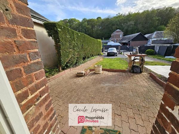 Maison 4 pièces avec terrasse, petit jardin et espace de stationnement