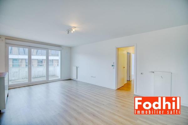 Appartement 4 pièces de 77 m²- 4éme avec balcon de 12 m² et 2 parkings.