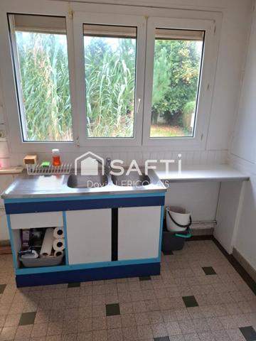 MAISON SUR SOUS SOL AVEC BEAU TERRAIN ET DEPENDANCES