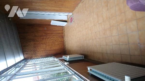 Maison de ville avec véranda et garage