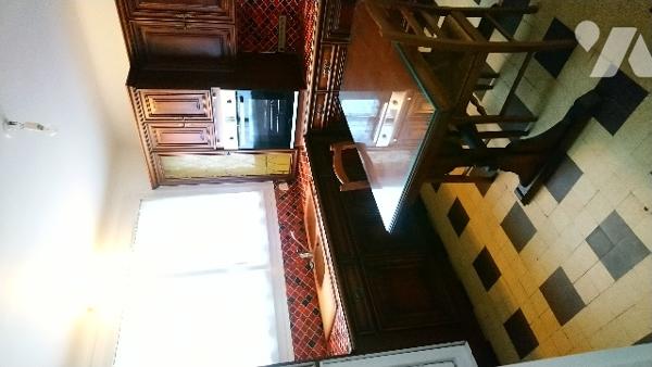 Maison de ville avec véranda et garage