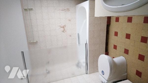 Maison de ville avec véranda et garage