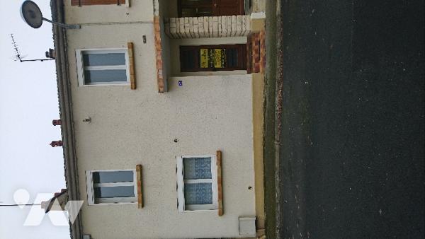 Maison de ville avec véranda et garage