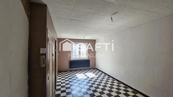 Votre prochain placement sécurisé: immeuble en centre ville avec locataires en place