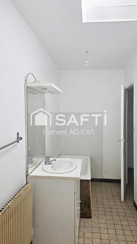 Votre prochain placement sécurisé: immeuble en centre ville avec locataires en place