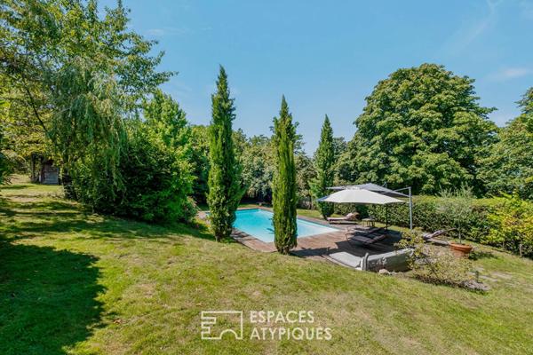 Propriété de caractère de 1920 au coeur d’un parc