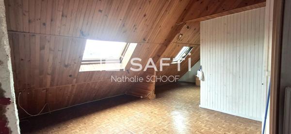 Au centre de Baud, un bien rare mêlant commerce et habitation.