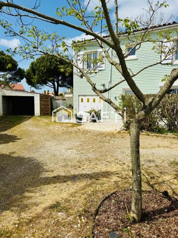 MAISON FAMILIALE  4 CH 1 BUREAU 2 GARAGES JARDIN