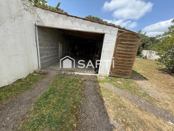 MAISON FAMILIALE  4 CH 1 BUREAU 2 GARAGES JARDIN