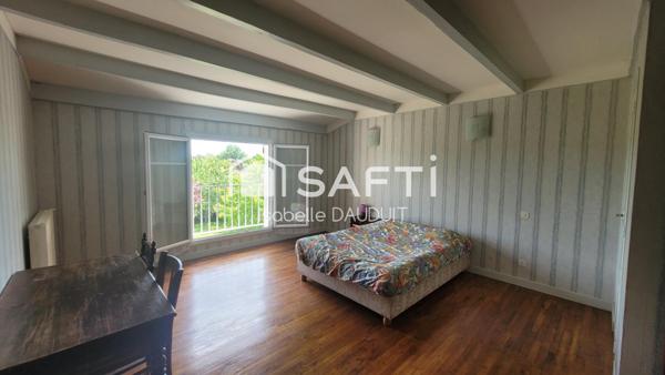 PAVILLON TRADITIONNEL 4CH SOUS-SOL ET GARAGE