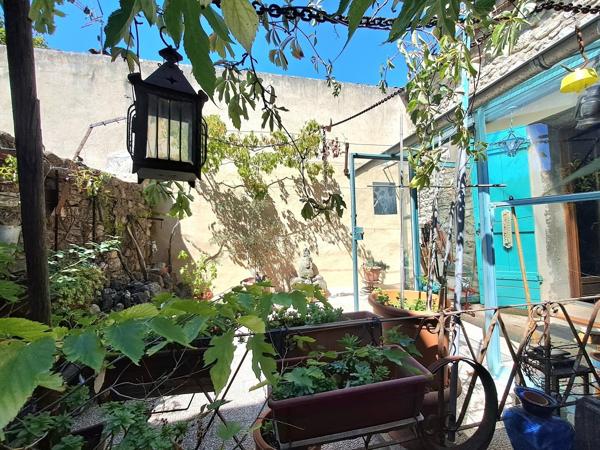 Authentique maison de village de caractère avec local à exploiter
