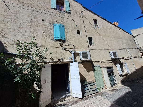 Authentique maison de village de caractère avec local à exploiter