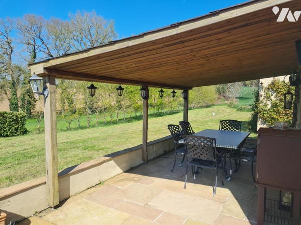 Maison en pierre avec dépendances située à 4 minutes des commodités et services