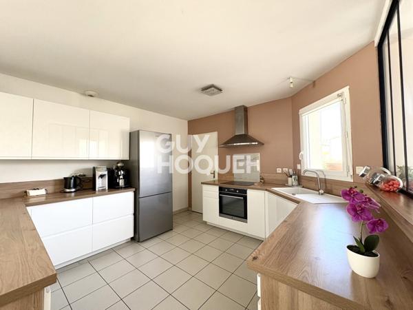 Maison à vendre 3 chambres + bureau de 94 m² avec jardin et garage
