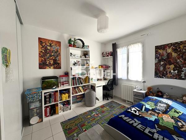 Maison à vendre 3 chambres + bureau de 94 m² avec jardin et garage