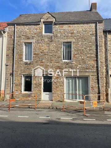 Maison en pierre avec jardin