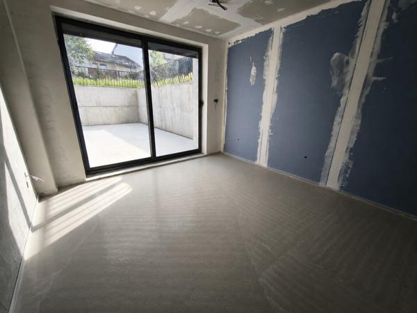 Appartement 4 pièces avec terrasse et jardin privatif