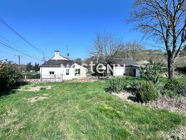 Jolie maison de 76 m² à vendre avec dépendance et jardin à Lhomme (72340)