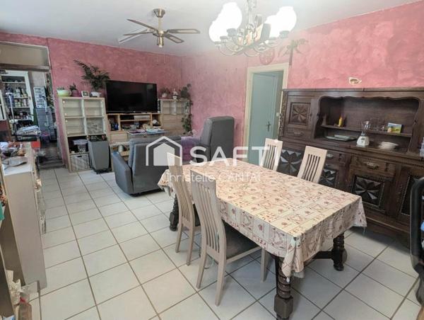 Maison 114 m², 4 chambres, terrain, garage.