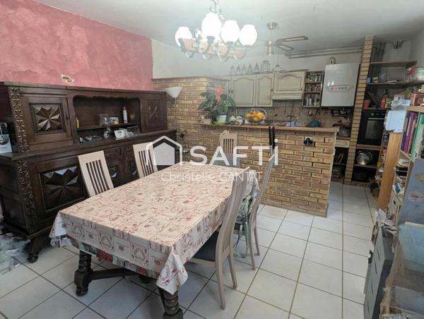 Maison 114 m², 4 chambres, terrain, garage.