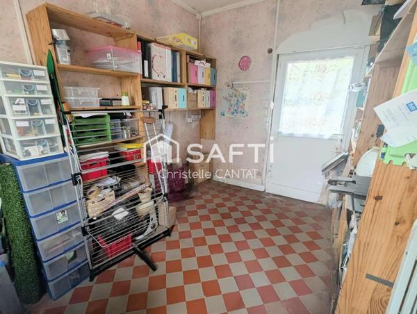 Maison 114 m², 4 chambres, terrain, garage.