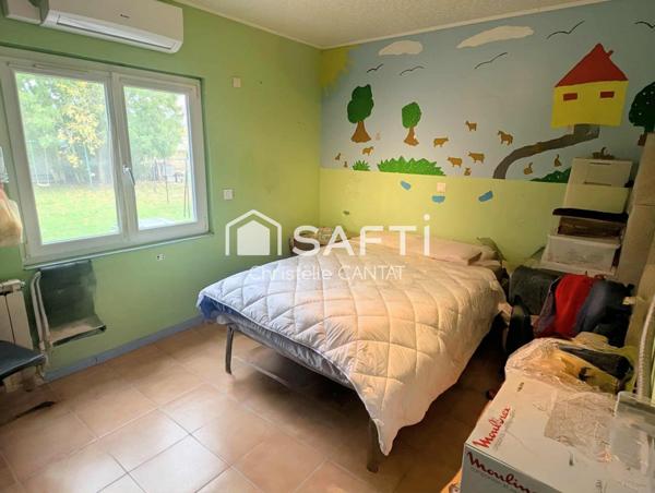 Maison 114 m², 4 chambres, terrain, garage.