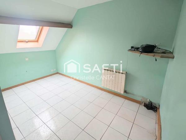 Maison 114 m², 4 chambres, terrain, garage.