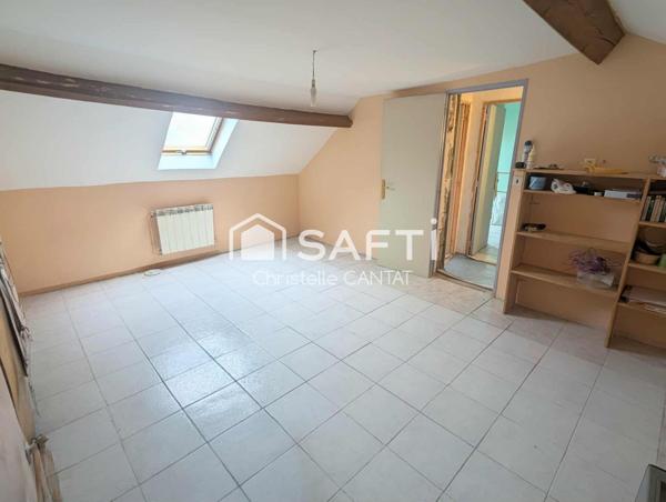 Maison 114 m², 4 chambres, terrain, garage.