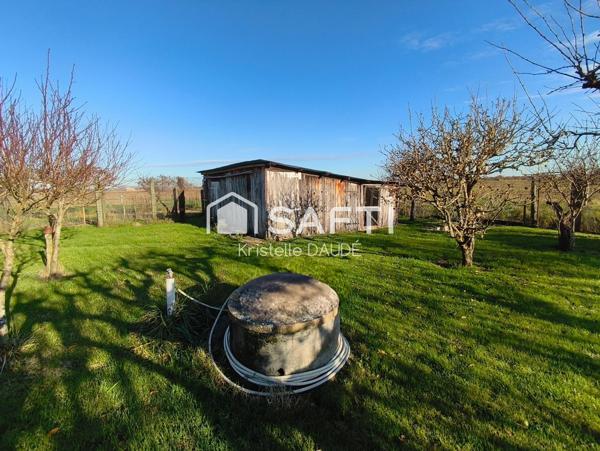 Maison familiale au calme - 4 chambres - garage - hangar 85 m²-