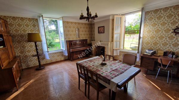 Maison de Maître à fort potentiel avec terrain de 3300 m² et dépendances, proche des commodités !