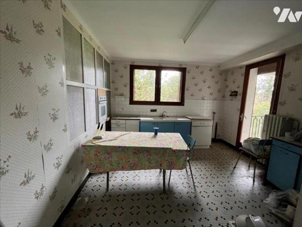 Maison à fort potentiel sur vaste terrain