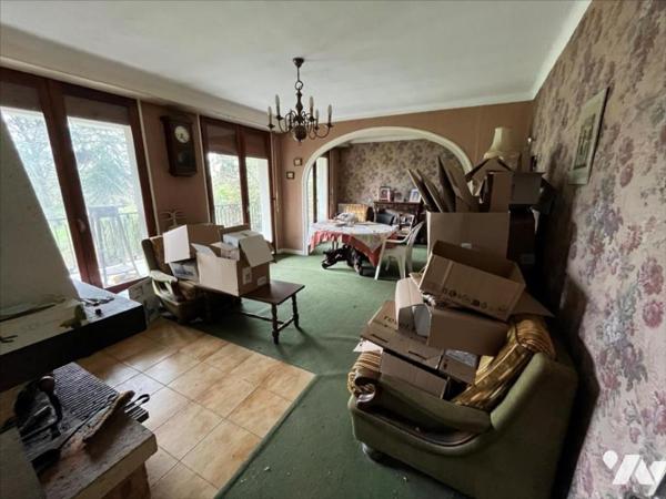 Maison à fort potentiel sur vaste terrain