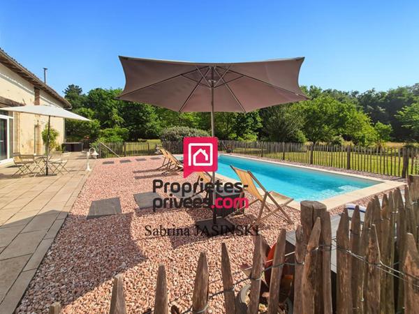 Longère de charme en pierre de 260 m2 sur terrain clos et boisé de 13 700 m², avec piscine et dépendances