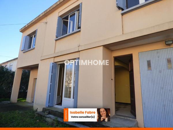 MAISON DES ANNEES 60, PROCHE CENTRE VILLE, JARDIN ET GARAGES.