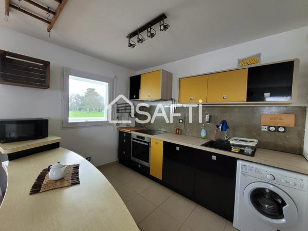 T4 AVEC TERRASSE - 2 PLACES DE PARKING ET CAVE