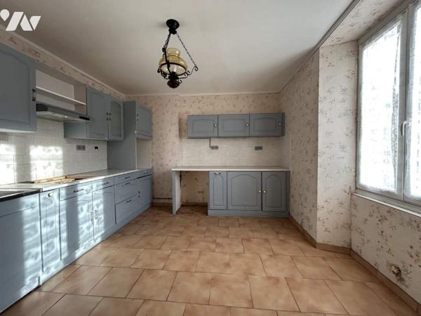 Maison à rénover avec potentiel et terrain