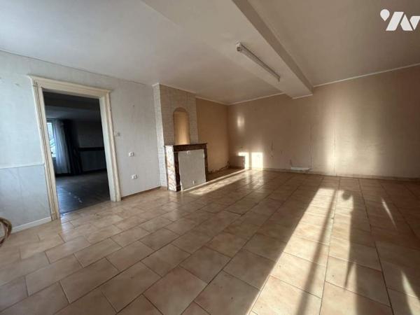 Maison à rénover avec potentiel et terrain