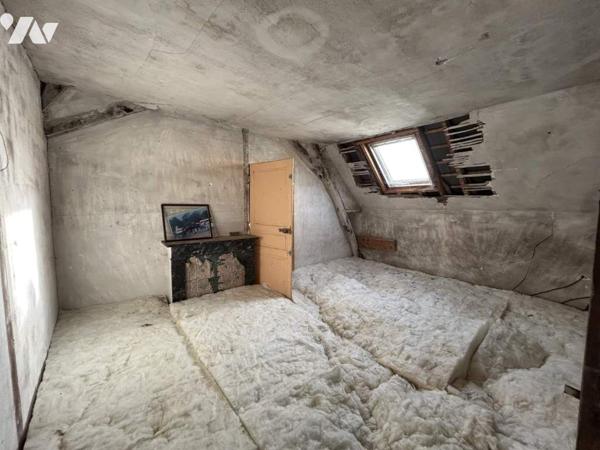 Maison à rénover avec potentiel et terrain