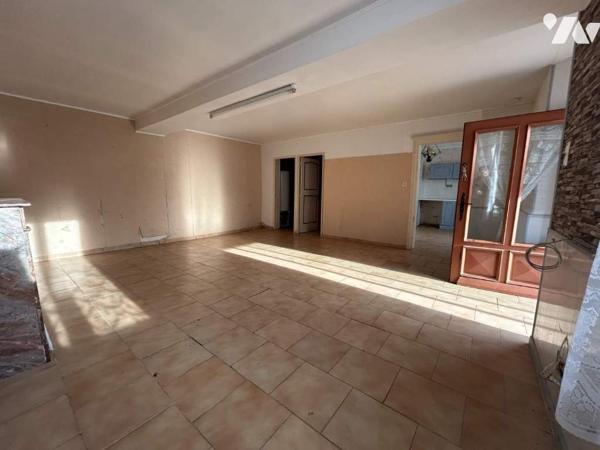 Maison à rénover avec potentiel et terrain