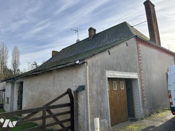 Maison à rénover avec potentiel et terrain