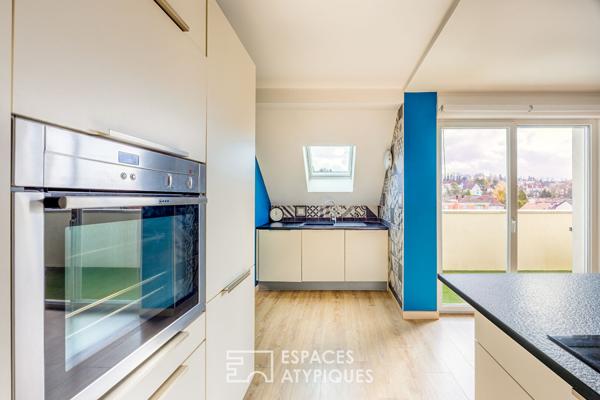 Duplex et sa terrasse à proximité des commodités