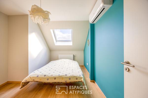 Duplex et sa terrasse à proximité des commodités