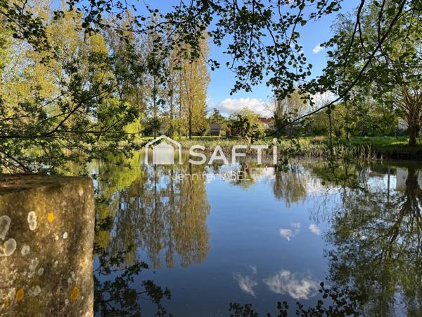 TERRAIN DE LOISIR AVEC ETANG ET MOBIL HOME