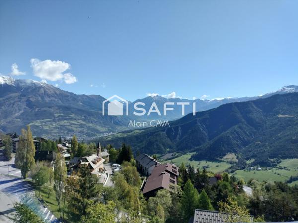 Studio de 31m² avec casier à ski, local partagé, placard privatif sur palier et parking