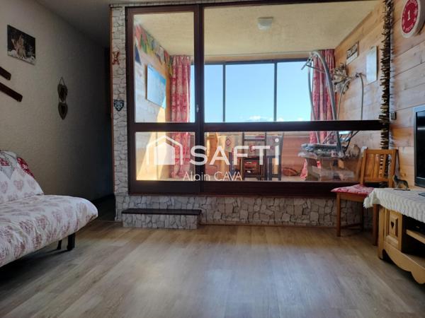 Studio de 31m² avec casier à ski, local partagé, placard privatif sur palier et parking