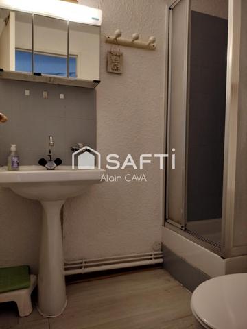 Studio de 31m² avec casier à ski, local partagé, placard privatif sur palier et parking