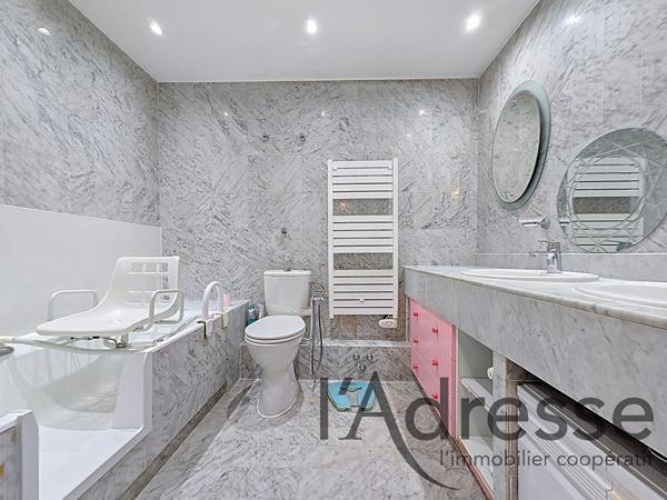 Appartement en RDJ 4 pièces 98m2 avec jardin, garage et piscine à Mandelieu